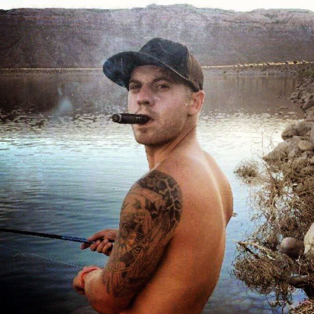 Tatoo Man Smokes Cigar – The CigarMonkeys