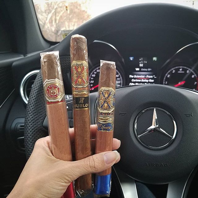luxus cars and premium cigars The CigarMonkeys