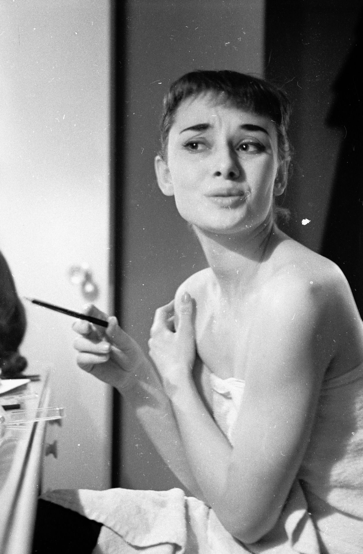 Audrey Hepburn British actress film and fashion icon smoking cigarette